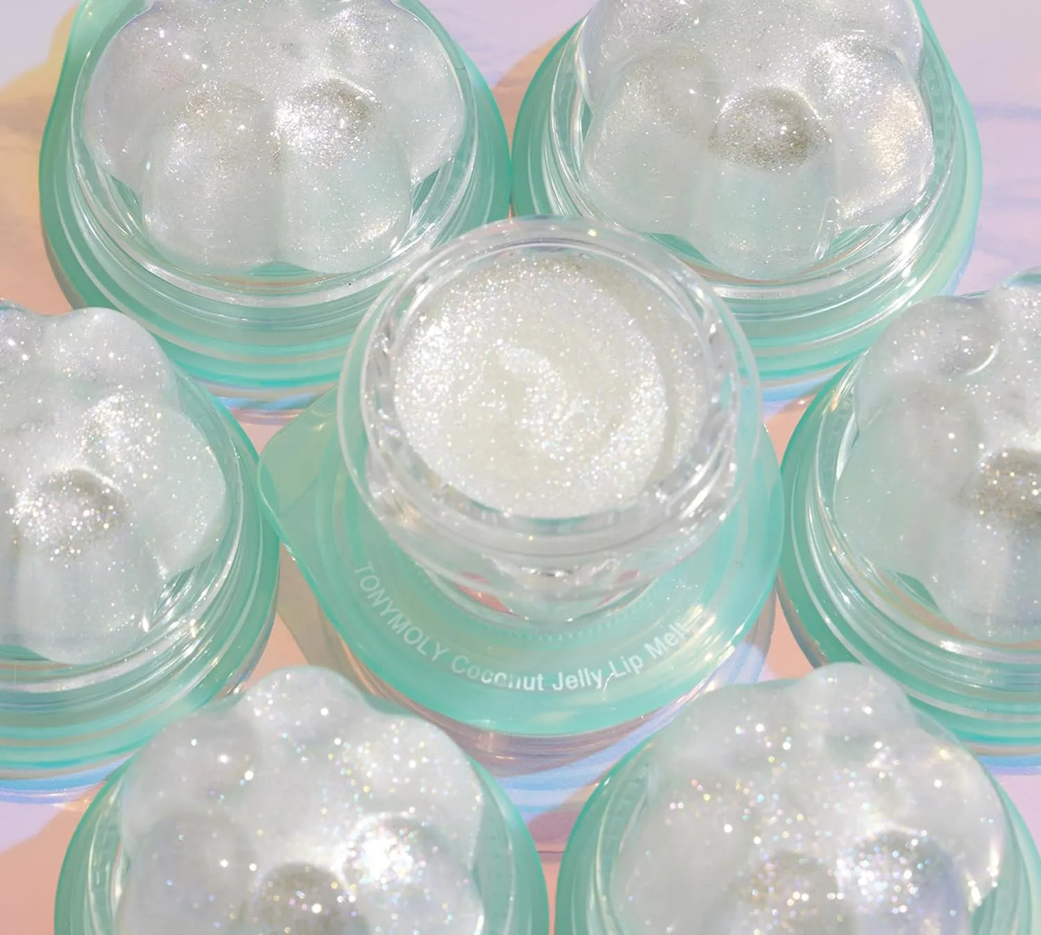 TONYMOLY Jelly Lip Melt, Limited Edition Moisturizing, Hydrating & Nourishing Glitter Lip Balm Treatment & Highlighter, Coconut 0.31 oz.